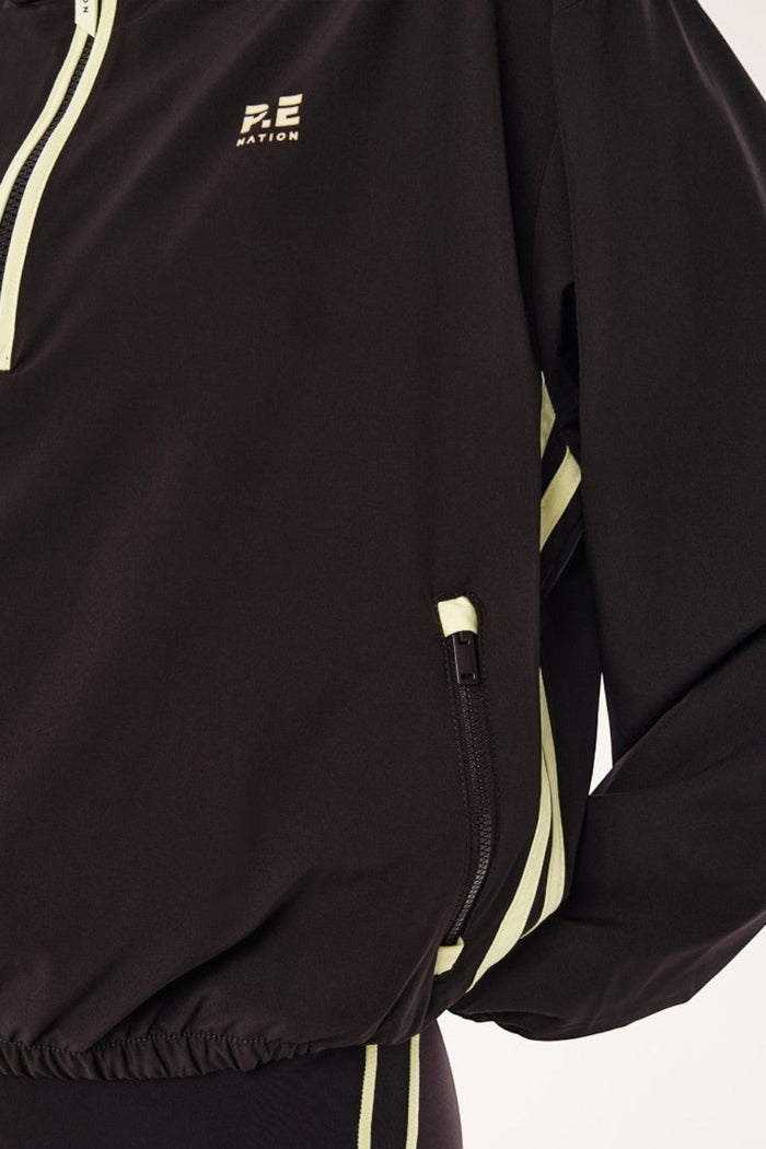 ELSHAM BOUTIQUE black Echo quarter zip jacket with lime green contrast binding and zipped side pockets