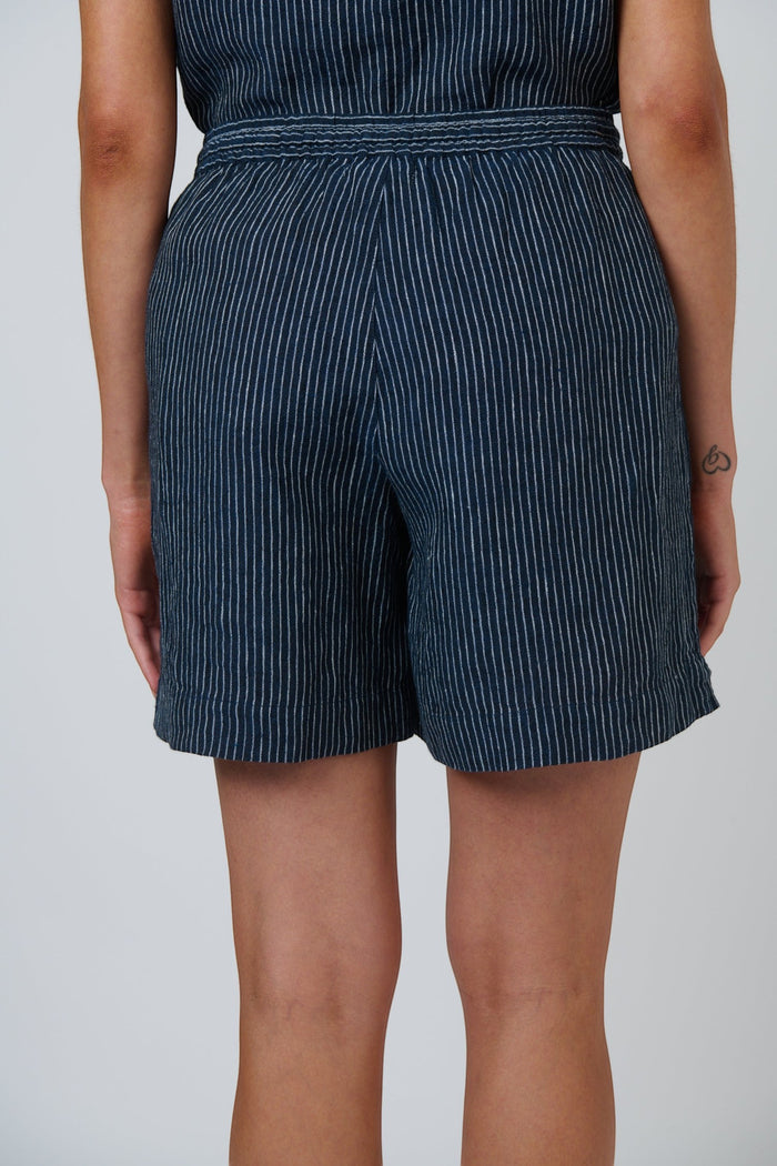 Back view of ELSHAM BOUTIQUE GA477 navy blue pinstripe linen shorts with a comfortable drawstring waistband.