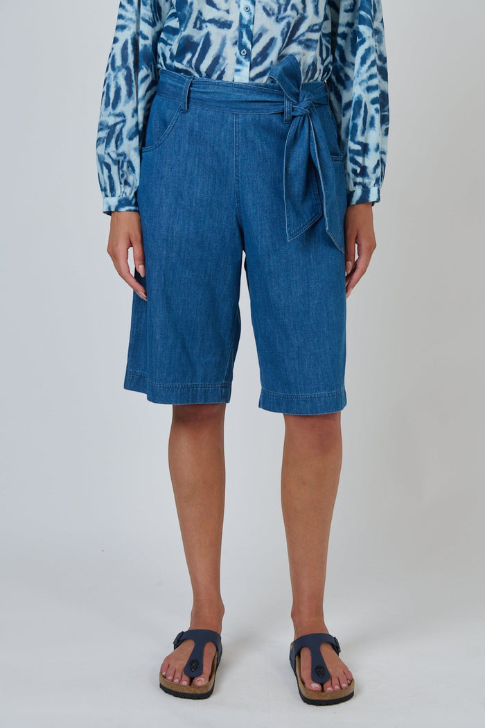 ELSHAM BOUTIQUE high-waisted chambray denim Bermuda shorts with a self-tie belt and wide-leg fit.