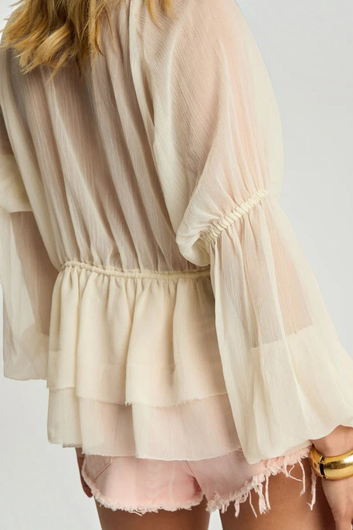 Back view of ELSHAM BOUTIQUE ivory sheer chiffon blouse with voluminous peasant sleeves and elasticated waist detail