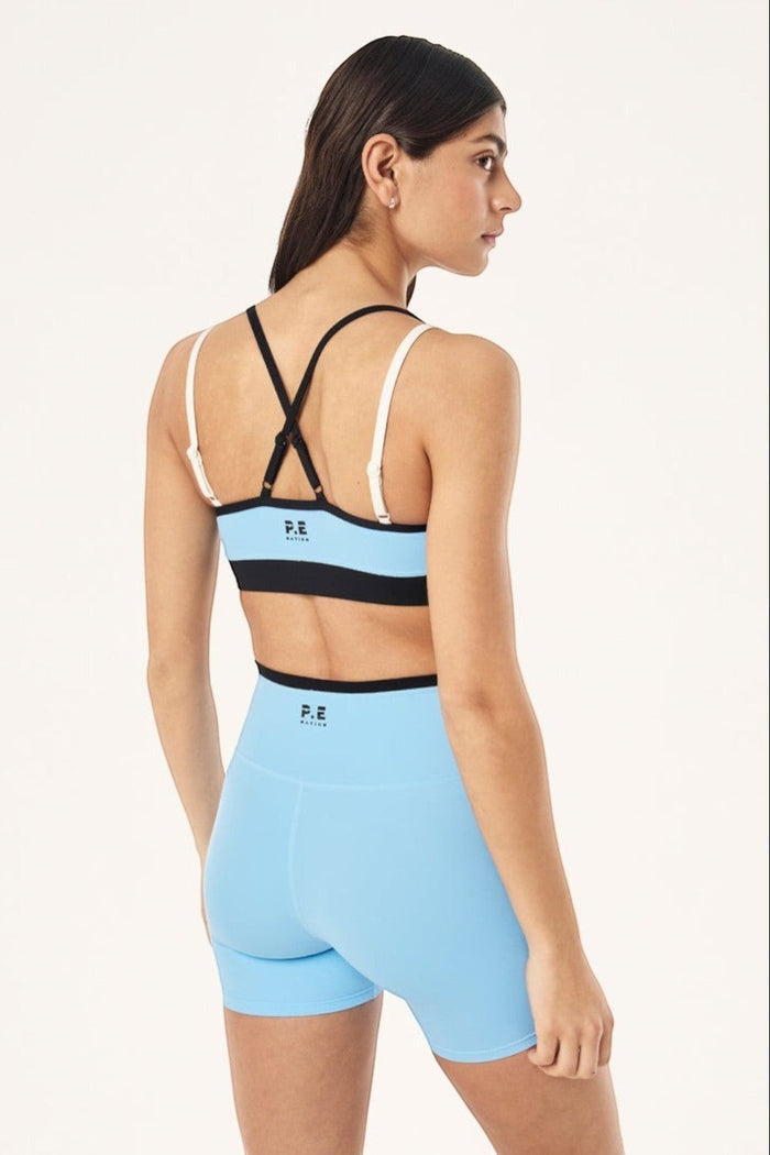 ELSHAM BOUTIQUE Paramount sports bra in Alaskan blue and black with adjustable double straps and V neckline