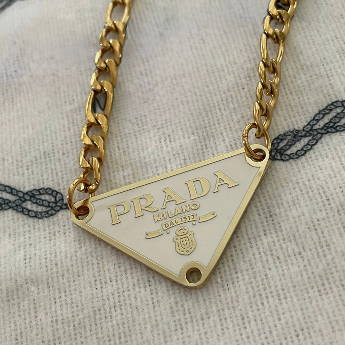 Repurposed Vintage Designer Necklace | Cream & Gold Triangular Prada Logo Necklace