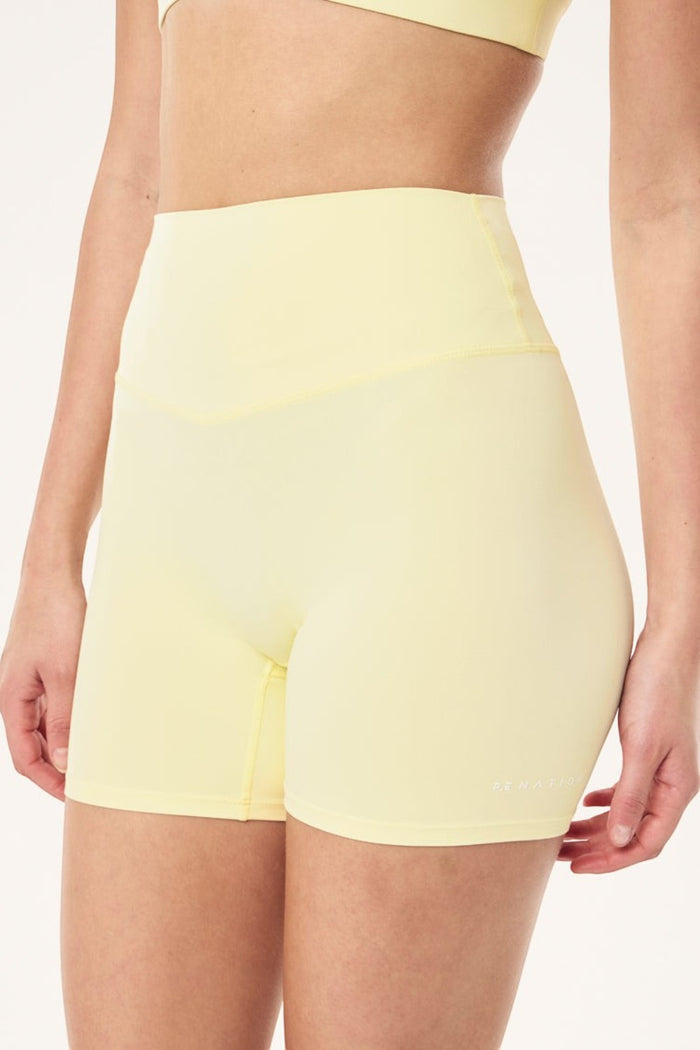 ELSHAM BOUTIQUE soft yellow 5-inch bike shorts with high-rise V-waistband in peached Studio Soft fabric