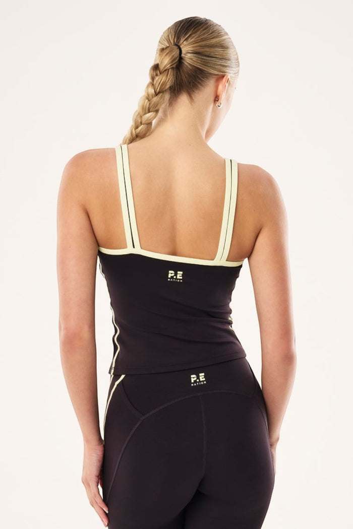 ELSHAM BOUTIQUE Solis Scoop Tank in black and soft yellow with thick contrast straps and back logo detail