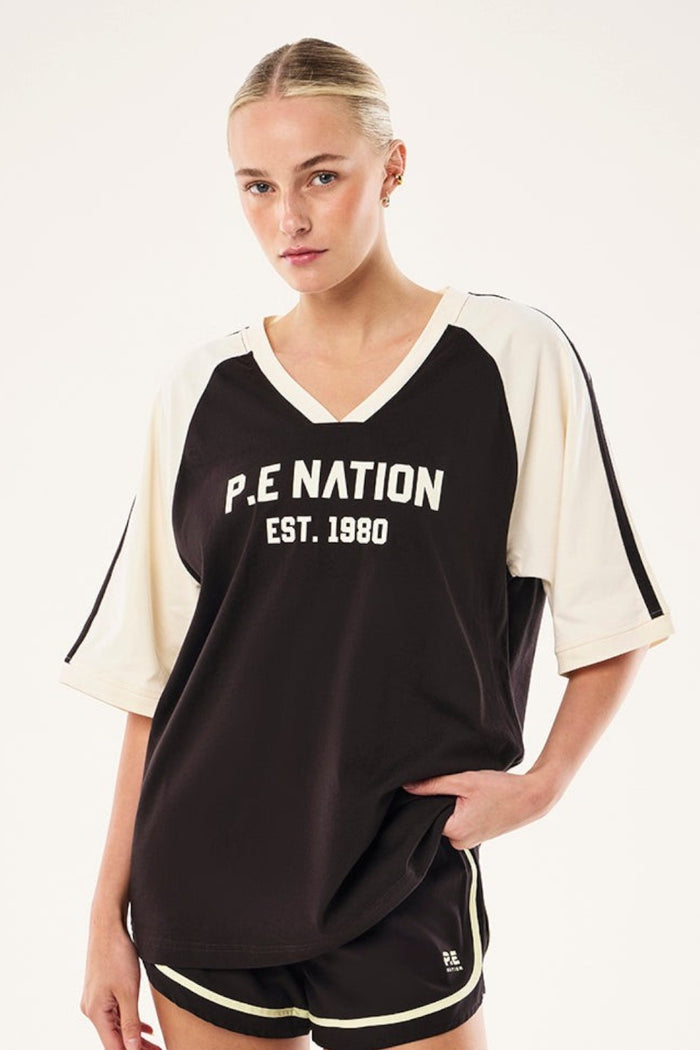 ELSHAM BOUTIQUE Spinout baseball tee in black and whisper white organic cotton with graphic print and V-neck