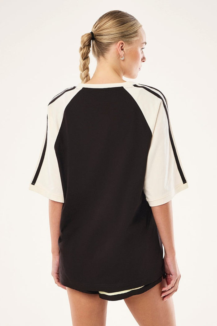 ELSHAM BOUTIQUE Spinout baseball tee in black and whisper white organic cotton with contrast binding, back view